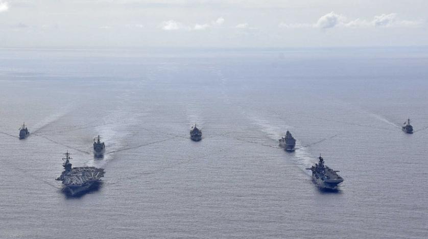 us_navy_ships_transit_the_philippine_sea_march_24_2020._reuters