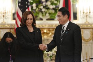 FILE – U.S. Vice President Kamala Harris, left, and Japan’s Prime Minister Fumio Kishida shake hands before the Japan-U.S. bilateral meeting at the Akasaka Palace state guest house in Tokyo, Sept. 26, 2022. Harris is trying to bolster relations between Japan and South Korea to present a united front to growing Chinese influence, but tension and bad relations between the two countries are not helping. (David Mareuil/Pool Photo via AP, File)