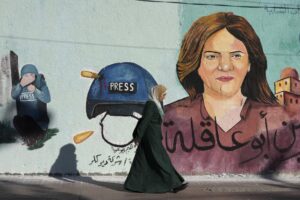 FILE – A mural of slain of Al Jazeera journalist Shireen Abu Akleh who was shot dead during an Israeli military raid in the West Bank town of Jenin, adorns a wall in Gaza City, May 15, 2022.The Israeli military acknowledged for the first time on Monday, Sept. 5, 2022, that one of its soldiers likely killed veteran Al Jazeera journalist Shireen Abu Akleh in May, saying its own investigation shows she was shot by mistake and that no one will face punishment. (AP Photo/Adel Hana, File)