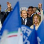 From left, The League’s Matteo Salvini, Forza Italia’s Silvio Berlusconi, and Brothers of Italy’s Giorgia Meloni attend the final rally of the center-right coalition in central Rome, Thursday, Sept. 22, 2022. Italians vote on Sunday for a new Parliament, and they could elect their first far-right premier of the post-war era. If opinion polls hold, Giorgia Meloni could be that premier, as well as become the first woman to lead an Italian government. (AP Photo/Alessandra Tarantino)