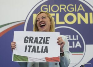 Far-Right party Brothers of Italy’s leader Giorgia Meloni shows a placard reading in Italian “Thank you Italy” at her party’s electoral headquarters in Rome, early Monday, Sept. 26, 2022. Italians voted in a national election that might yield the nation’s first government led by the far right since the end of World War II. (AP Photo/Gregorio Borgia)