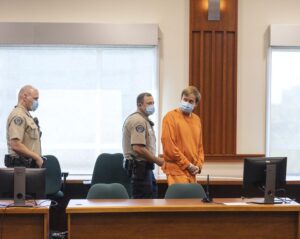 Former state Rep. Aaron von Ehlinger, right, is led out of the courtroom after his sentencing at the Ada County Courthouse on Wednesday, Aug. 31, 2022, in Boise, Idaho. Von Ehlinger was convicted earlier this year of raping a legislative intern and was sentenced on Wednesday to a total of 20 years, with at least eight years to be served in prison. (Sarah A. Miller/Idaho Statesman via AP)