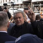 Former White House strategist Steve Bannon, arrives at court, Thursday, Sept. 8, 2022, in New York. Bannon surrendered to New York authorities, and is expected to be charged in border wall scheme. (AP Photo/Yuki Iwamura)