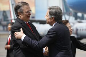 Mexican Foreign Minister Marcelo Ebrard, left, welcomes US Secretary of State Antony Blinken as Blinken arrives to Benito Juarez International Airport in Mexico City, Monday, Sept. 12, 2022. (Raquel Cunha/Pool via AP)