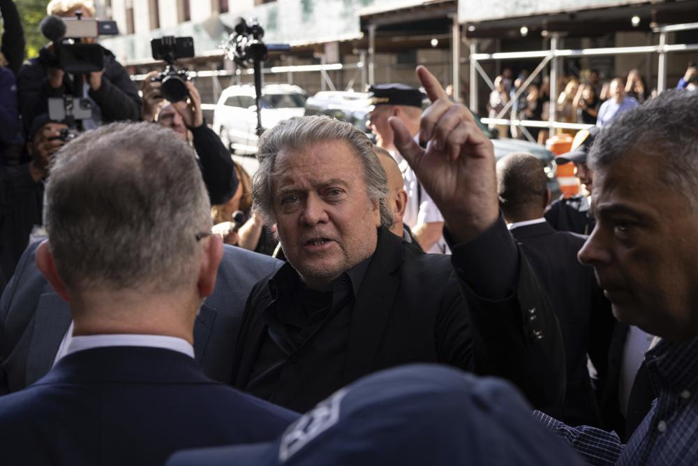 Former White House strategist Steve Bannon, arrives at court, Thursday, Sept. 8, 2022, in New York. Bannon surrendered to New York authorities, and is expected to be charged in border wall scheme. (AP Photo/Yuki Iwamura)