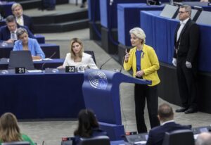 European Commission President Ursula von der Leyen gestures as she speaks on Ukraine at the European Parliament in Strasbourg, eastern France, Wednesday, Sept. 14, 2022. Olena Zelenska, the first lady of Ukraine, center. (AP Photo/Jean-Francois Badias)