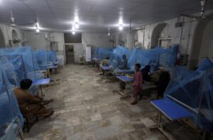 Pakistani patients suffering from dengue fever, a mosquito-borne disease, are treated in an isolation ward, at a hospital in Karachi, Pakistan, Saturday, Sept. 24, 2022. Pakistan has deployed thousands of additional doctors and paramedics in the country’s worst flood-hit province to contain the spread of diseases that have killed hundreds of people among the flood victims, officials said Friday. (AP Photo/Fareed Khan)