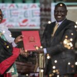 Kenya’s new president William Ruto, right, accompanied by Kenya’s Supreme Court Chief Justice Martha Koome, is sworn in to office at a ceremony held at Kasarani stadium in Nairobi, Kenya Tuesday, Sept. 13, 2022. William Ruto was sworn in as Kenya’s president on Tuesday after narrowly winning the Aug. 9 election and after the Supreme Court last week rejected a challenge to the official results by losing candidate Raila Odinga. (AP Photo/Brian Inganga)