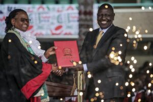 Kenya’s new president William Ruto, right, accompanied by Kenya’s Supreme Court Chief Justice Martha Koome, is sworn in to office at a ceremony held at Kasarani stadium in Nairobi, Kenya Tuesday, Sept. 13, 2022. William Ruto was sworn in as Kenya’s president on Tuesday after narrowly winning the Aug. 9 election and after the Supreme Court last week rejected a challenge to the official results by losing candidate Raila Odinga. (AP Photo/Brian Inganga)