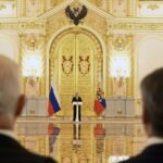 Russian President Vladimir Putin, center, delivers his speech as he attends a ceremony to receive credentials from newly appointed foreign ambassadors to Russia, at the Kremlin, in Moscow, Tuesday, Sept. 20, 2022. (Pavel Bednyakov, Sputnik, Kremlin Pool Photo via AP)