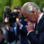 King Charles reflected on floral tributes left outside the palace following the death of his mother, the Queen
