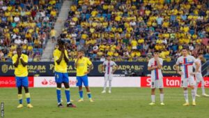 The players were taken from the pitch when the severity of the fan’s condition was established