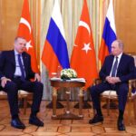 Russian President Vladimir Putin listens to Turkish President Tayyip Erdogan during a meeting in Sochi, Russia August 5, 2022. Sputnik/Vyacheslav Prokofyev/Pool via REUTERS