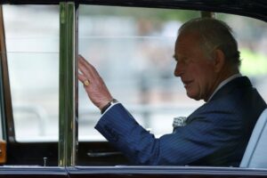 Britain’s King Charles waves as he leaves Buckingham Palace, following the passing of Britain’s Queen Elizabeth, in London, Britain, September 10, 2022. REUTERS/Peter Cziborra