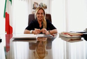 Giorgia Meloni, leader of far-right Fratelli d’Italia party, poses for a picture before an interview with Reuters, in Rome, Italy, August 24, 2022. REUTERS/Yara Nardi