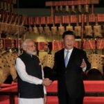 Chinese President Xi Jinping and Indian Prime Minister Narendra Modi shake hands as they visit the Hubei Provincial Museum in Wuhan, Hubei province, China April 27, 2018. China Daily via REUTERS/File Photo