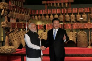 Chinese President Xi Jinping and Indian Prime Minister Narendra Modi shake hands as they visit the Hubei Provincial Museum in Wuhan, Hubei province, China April 27, 2018. China Daily via REUTERS/File Photo