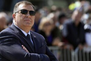 FILE – Bosnian Serb member of the tripartite Presidency of Bosnia Milorad Dodik watches military exercises on Batajnica, military airport near Belgrade, Serbia, Saturday, April 30, 2022. Dodik, a member of Bosnia’s tripartite presidency, claimed at a pre-election rally Wednesday that the Bosnian Serb spying agency is now capable of listening to the conversations by U.S. Ambassador Michael Murphy and his staff. The U.S. Embassy in Sarajevo on Thursday described claims by the Bosnian Serb leader that his security services are eavesdropping on the American ambassador to Sarajevo as “blustering” and added that his separatist policies are “gambling” with the future of the Serb entity in the Balkan state. (AP Photo/Darko Vojinovic, File)