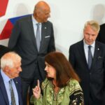 Sweden’s Foreign Minister Ann Linde, center, speaks with European Union foreign policy chief Josep Borrell, second left, during a group photo of EU foreign ministers at the Prague Congress Center in Prague, Czech Republic, Wednesday, Aug. 31, 2022. Others from left, Romania’s Foreign Minister Bogdan Aurescu, Greek Foreign Minister Nikos Dendias, Finland’s Foreign Minister Pekka Haavisto and Italy’s Foreign Minister Luigi Di Maio. (AP Photo/Petr David Josek)