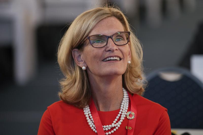 Doreen Bogdan-Martin of the United States, candidate for secretary general, smiles during the opening session of The International Telecommunication Union (ITU), the United Nations specialized agency for information and communication technologies, in Bucharest, Romania, Monday, Sept. 26, 2022. The ITU Plenipotentiary Conference 2022 will run in the Romanian capital until Oct. 14 and will elect a new Secretary General. (AP Photo/Vadim Ghirda)