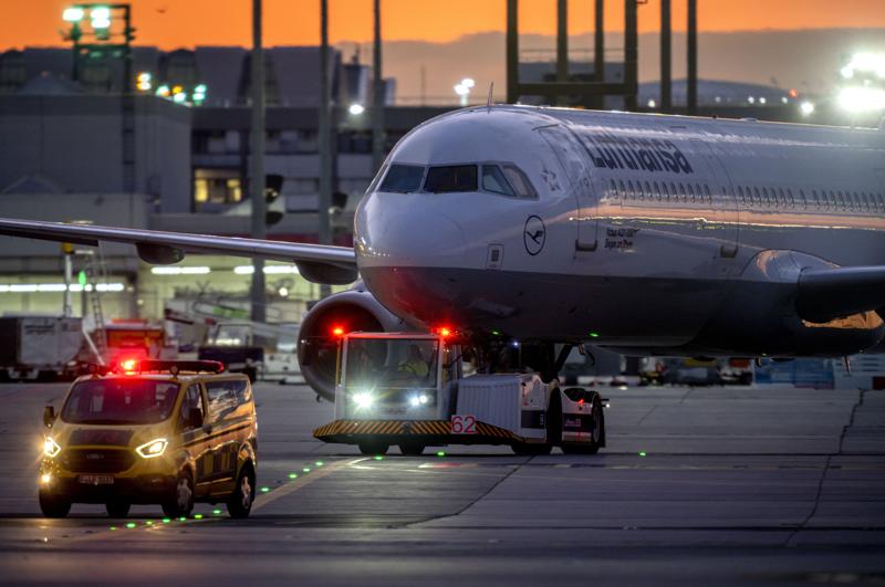 A Lufthansa aircrafts is pulled to a park position at the airport in Frankfurt, Germany, Friday, Sept.2, 2022. Hundreds of Lufthansa flights have been canceled as pilots stage a one-day strike to press their demands for better pay and conditions at Germany’s biggest carrier. (AP Photo/Michael Probst)