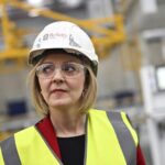 British Prime Minister Liz Truss visits Berkeley Modular, in Northfleet, Kent, Britain, Friday, Sept. 23, 2022. (Dylan Martinez/Pool Photo via AP)