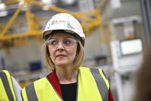 British Prime Minister Liz Truss visits Berkeley Modular, in Northfleet, Kent, Britain, Friday, Sept. 23, 2022. (Dylan Martinez/Pool Photo via AP)