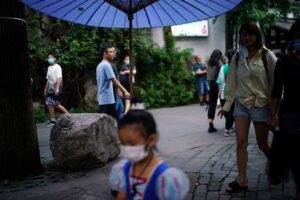 People walk on Jinli Ancient Street, following the coronavirus disease (COVID-19) outbreak, in Chengdu, Sichuan province, China September 8, 2020. REUTERS/Tingshu Wang/File Photo