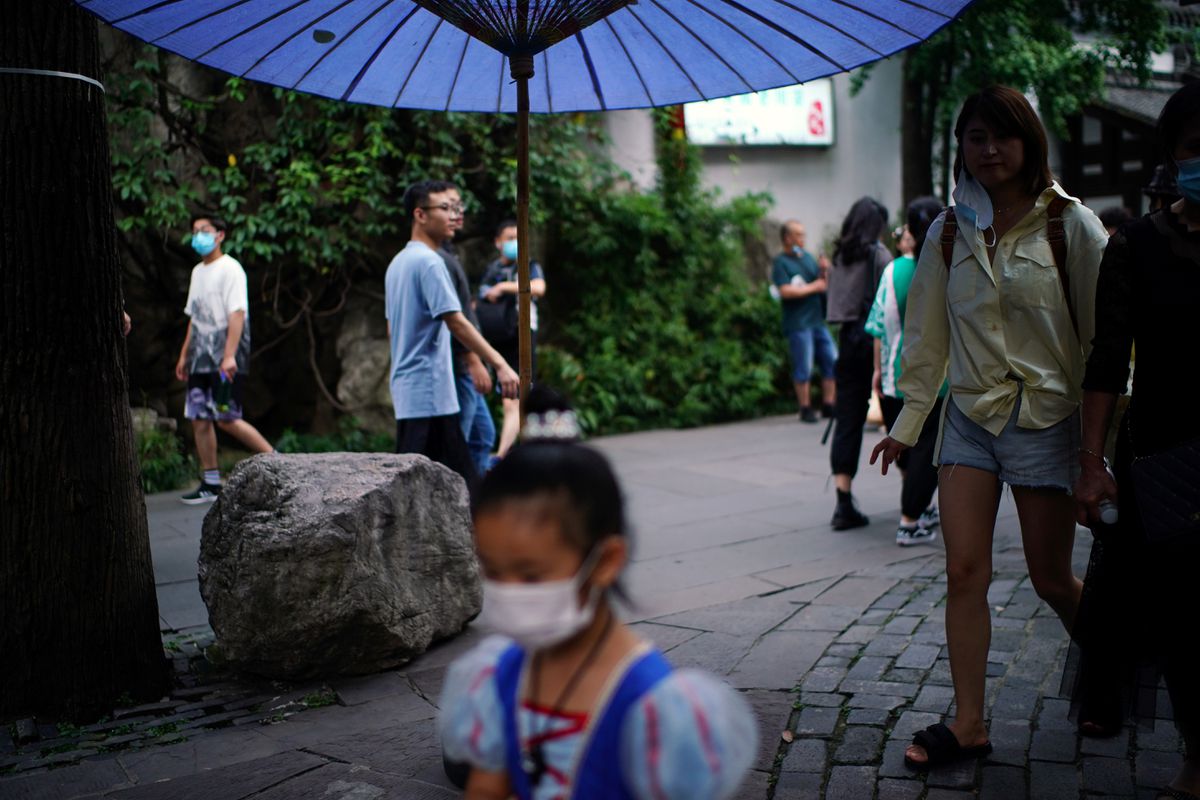 People walk on Jinli Ancient Street, following the coronavirus disease (COVID-19) outbreak, in Chengdu, Sichuan province, China September 8, 2020. REUTERS/Tingshu Wang/File Photo
