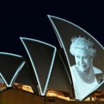 An image of Britain’s Queen Elizabeth is illuminated on the sail of Sydney Opera House, following the Queen’s passing, in Sydney, Australia, September 9, 2022. REUTERS/Jaimi Joy