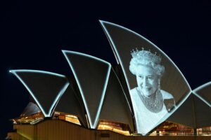 An image of Britain’s Queen Elizabeth is illuminated on the sail of Sydney Opera House, following the Queen’s passing, in Sydney, Australia, September 9, 2022. REUTERS/Jaimi Joy