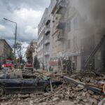 Firefighters work at the site of a residential building hit by a Russian military strike, amid Russia’s attack on Ukraine, in Kharkiv, Ukraine September 6, 2022. REUTERS/Viacheslav Ratynskyi
