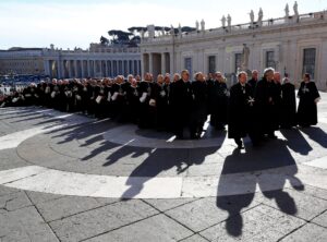 Members of the Order of the Knights of Malta arrive in St. Peter Basilica for their 900th anniversary in Vatican February 9, 2013. REUTERS/Alessandro Bianchi/File Photo