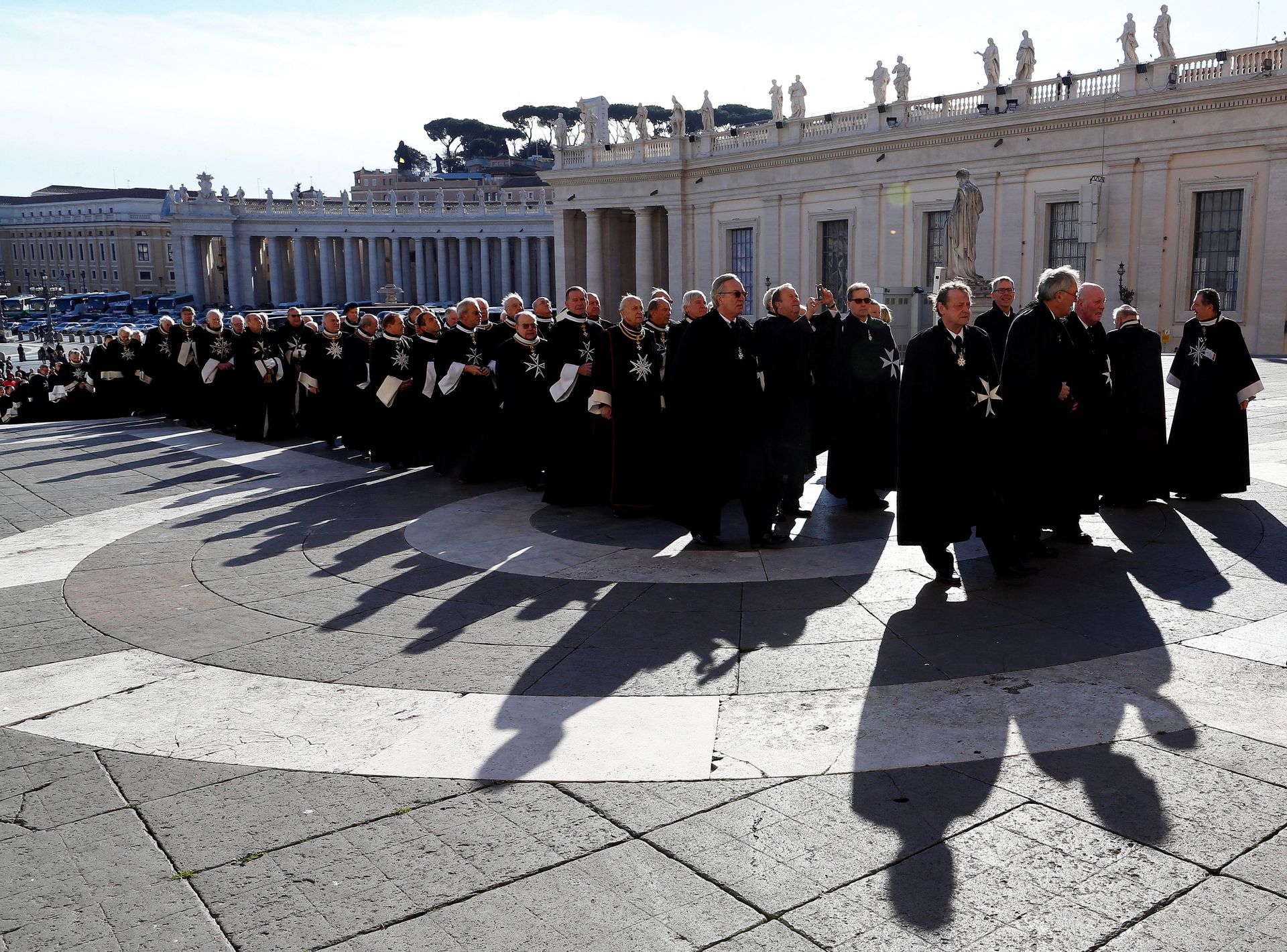 Members of the Order of the Knights of Malta arrive in St. Peter Basilica for their 900th anniversary in Vatican February 9, 2013. REUTERS/Alessandro Bianchi/File Photo