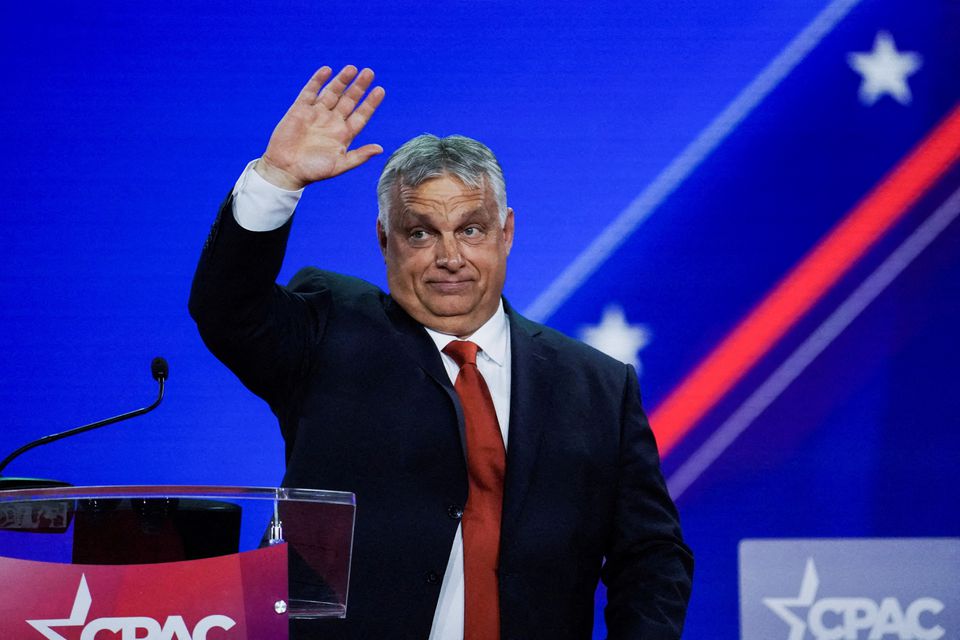 Prime Minister of Hungary Viktor Orban waves at the audience during general session at the Conservative Political Action Conference (CPAC) in Dallas, Texas, U.S., August 4, 2022. REUTERS/Go Nakamura