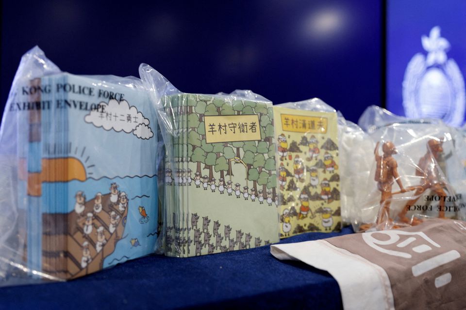 Children’s books are pictured during a news conference after five people were arrested on suspicion of conspiring to publish “seditious material” with the intent of inciting public hatred towards the government among children, in Hong Kong, China, July 22, 2021. REUTERS/Tyrone Siu