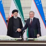 Uzbekistan’s President Shavkat Mirziyoyev meets Iran’s counterpart Ebrahim Raisi ahead of the Shanghai Cooperation Organization (SCO) summit in Samarkand, Uzbekistan September 14, 2022. Foreign Ministry of Uzbekistan/Handout via REUTERS