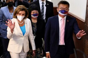 U.S. House of Representatives Speaker Nancy Pelosi walks next to Legislative Yuan Vice President Tsai Chi-chang as she leaves the parliament in Taipei, Taiwan August 3, 2022. REUTERS/Ann Wang/File Photo