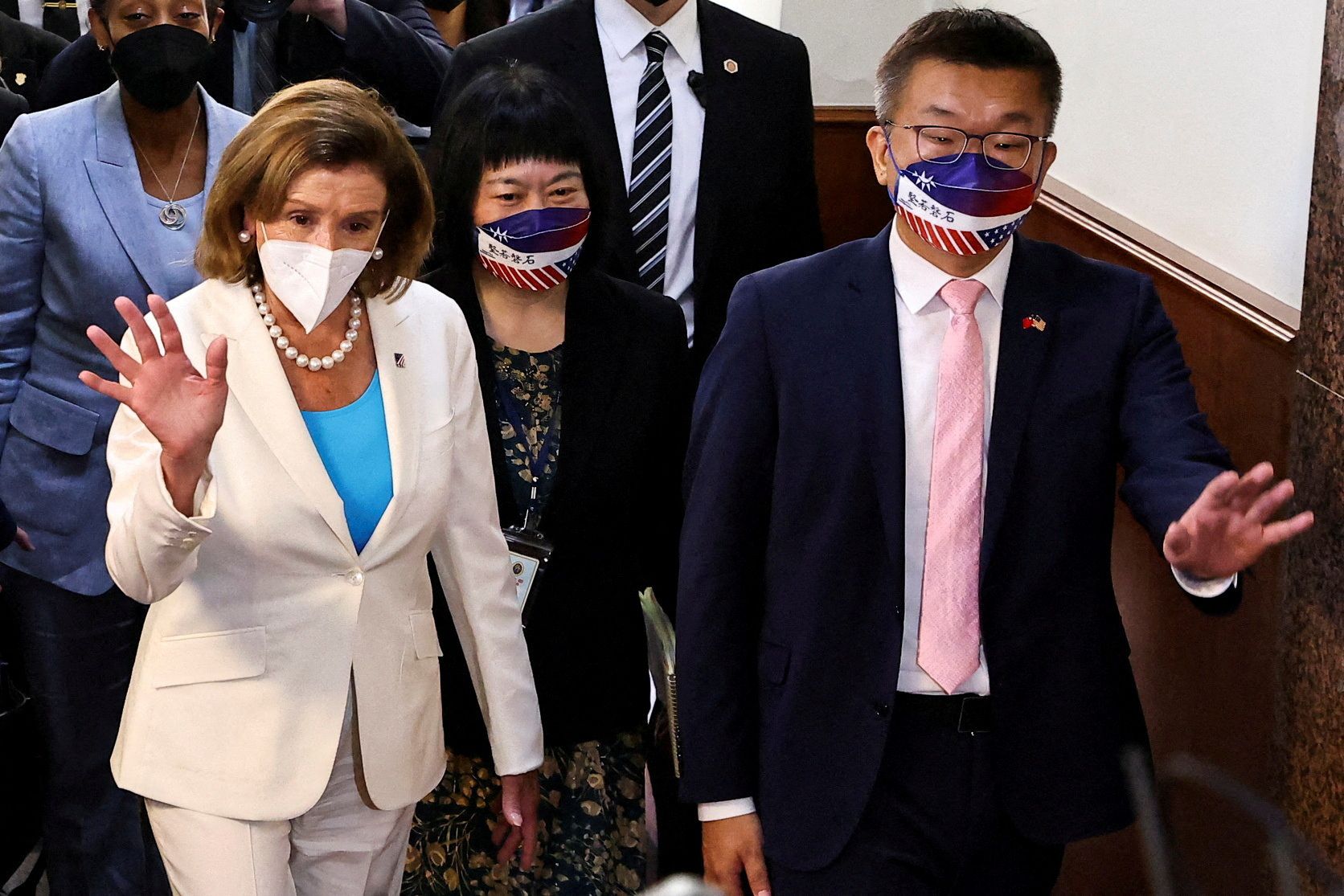 U.S. House of Representatives Speaker Nancy Pelosi walks next to Legislative Yuan Vice President Tsai Chi-chang as she leaves the parliament in Taipei, Taiwan August 3, 2022. REUTERS/Ann Wang/File Photo