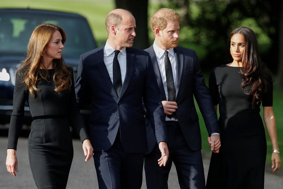 Britain’s William, Prince of Wales, Catherine, Princess of Wales, Prince Harry and Meghan, the Duchess of Sussex walk outside Windsor Castle, following the passing of Britain’s Queen Elizabeth, in Windsor, Britain, September 10, 2022. REUTERS/Peter Nicholls