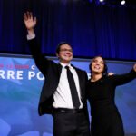 Leadership candidate Pierre Poilievre and wife Anaida Poilievre wave onstage during Canada’s Conservative Party leadership election in Ottawa, Ontario, Canada September 10, 2022. REUTERS/Blair Gable