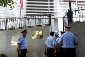 Police officers enter the Embassy of the Islamic Republic of Iran, as Albania cuts ties with Iran and orders diplomats to leave over cyberattack, in Tirana, Albania, September 8, 2022. REUTERS/Florion Goga