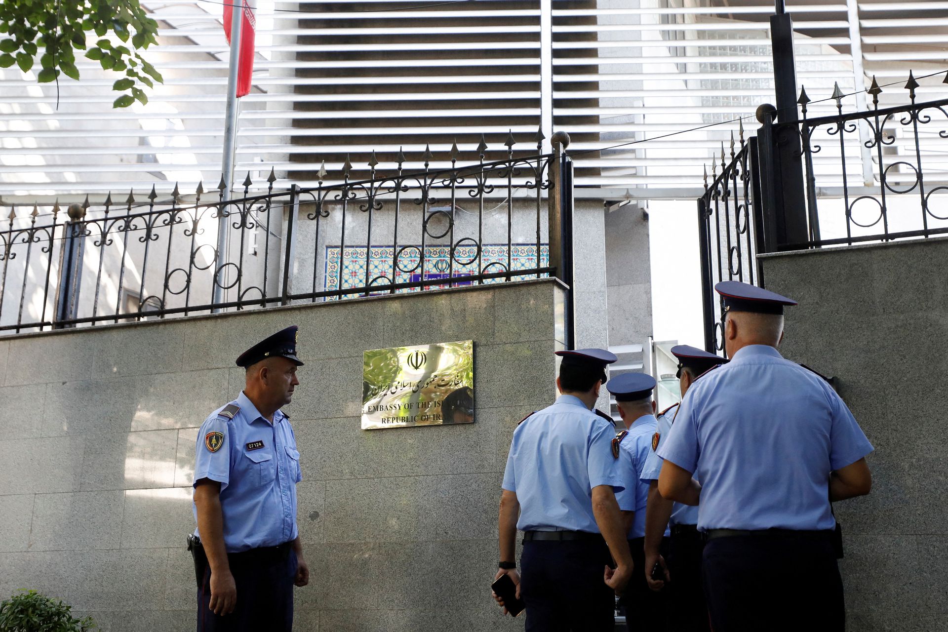Police officers enter the Embassy of the Islamic Republic of Iran, as Albania cuts ties with Iran and orders diplomats to leave over cyberattack, in Tirana, Albania, September 8, 2022. REUTERS/Florion Goga