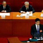 National People’s Congress (NPC) Standing Committee Chairman Li Zhanshu speaks at the second plenary session of the NPC at the Great Hall of the People in Beijing, China March 8, 2022. REUTERS/Carlos Garcia Rawlins