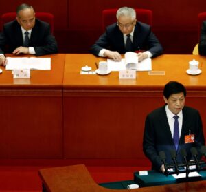 National People’s Congress (NPC) Standing Committee Chairman Li Zhanshu speaks at the second plenary session of the NPC at the Great Hall of the People in Beijing, China March 8, 2022. REUTERS/Carlos Garcia Rawlins