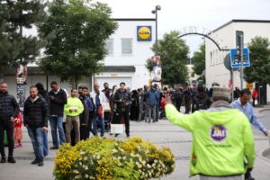 People queue to vote at a polling station for early voting in the suburb of Rinkeby, Stockholm, Sweden, September 10, 2022. TT News Agency/Ali Lorestani via REUTERS