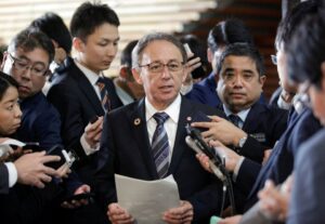 Okinawa Governor Denny Tamaki speaks to the media after a meeting with Japan’s then-Prime Minister Shinzo Abe (not in picture) at Abe’s official residence in Tokyo, Japan, March 1, 2019. Kimimasa Mayama/Pool via Reuters/File Photo