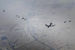 This photo released by the U.S. Air Force shows a B-52H Stratofortress assigned to the 5th Bomb Wing, Minot Air Force Base, North Dakota, flying over the Middle East on Sunday, Sept. 4, 2022. The United States military said Monday it flew a pair of nuclear-capable B-52 long-distance bombers over the Middle East in a show of force, the latest such mission in the region as tensions remain high between Washington and Tehran. (Staff Sgt. Charles Fultz/U.S. Air Force via AP)
