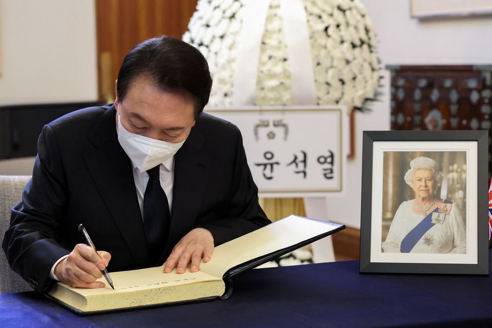 South Korea’s President Yoon Suk-yeol leaves his condolence message following the death of Britain’s Queen Elizabeth, at the British Embassy in Seoul, South Korea, September 9, 2022. The Presidential Office/Yonhap via REUTERS