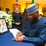 Queen Elizabeth: Buhari signs condolence register, condoles Royal Family